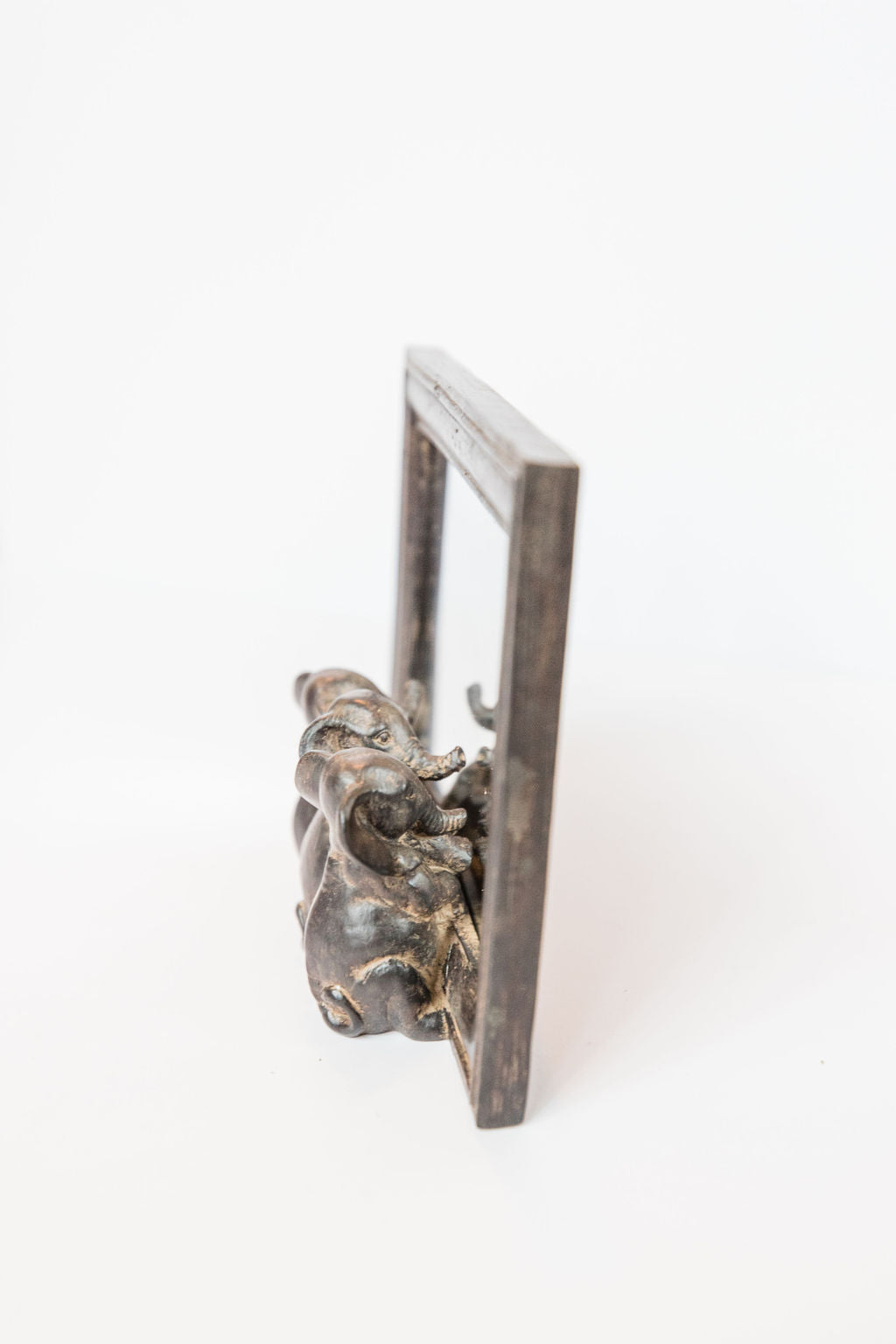 Elephants Peeking In Mirror