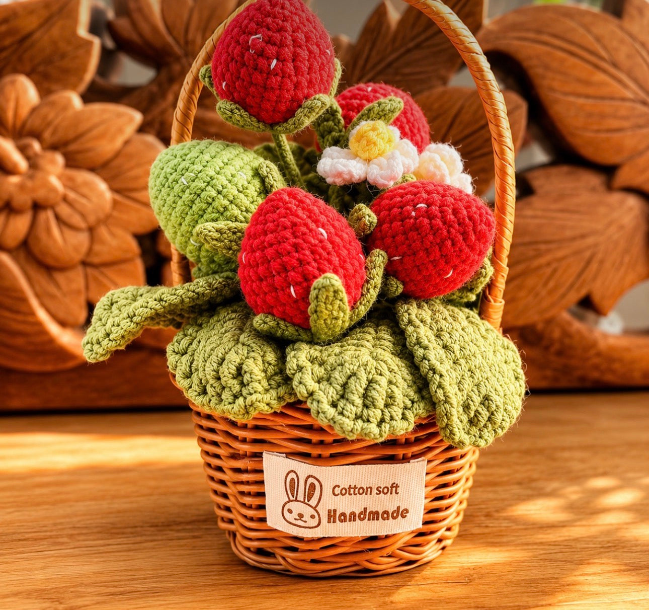 Wicker Basket Filled With A Crocheted Strawberry Plant